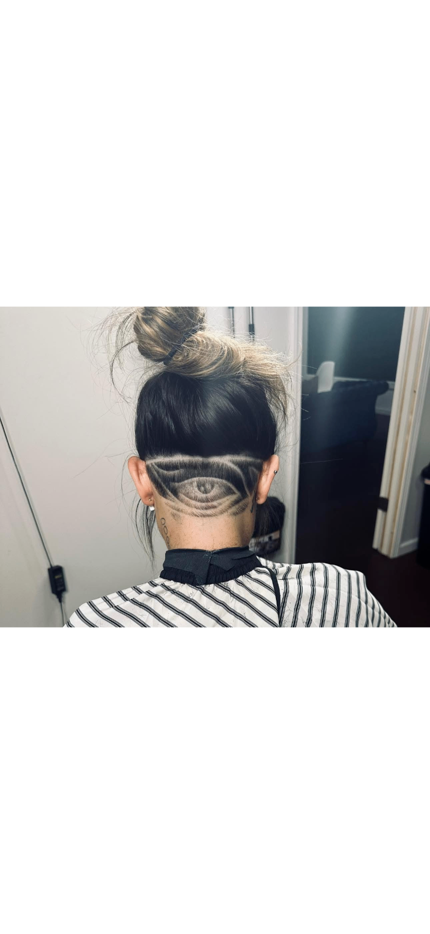 Artistic hair design showing intricate pattern work